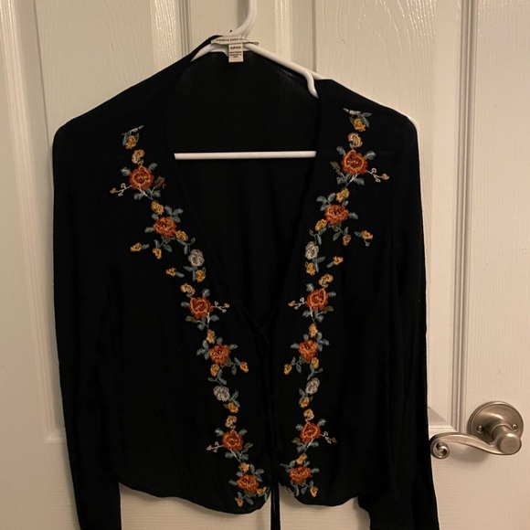 Black low cut tie blouse. - Picture 2 of 3